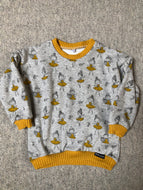 Example: Oversized sweaters in different patterns and sizes